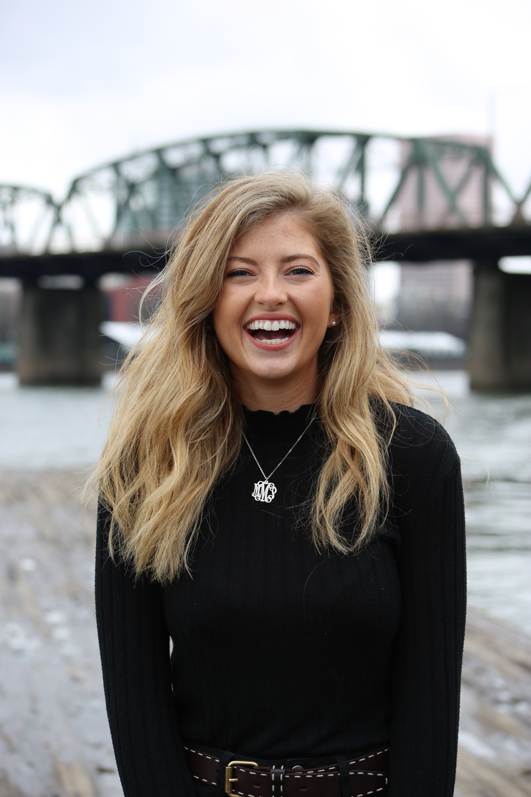 Smiling Woman Standing near River